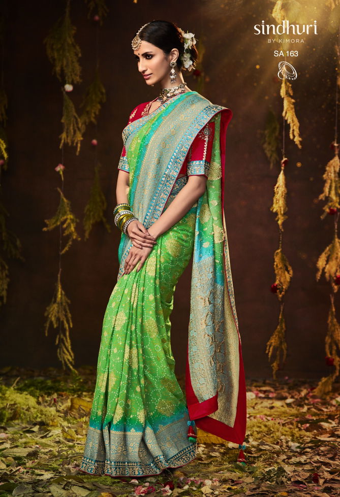 Bandhej Sindhuri By Kimora Heavy Wedding Bridal Saree Catalog